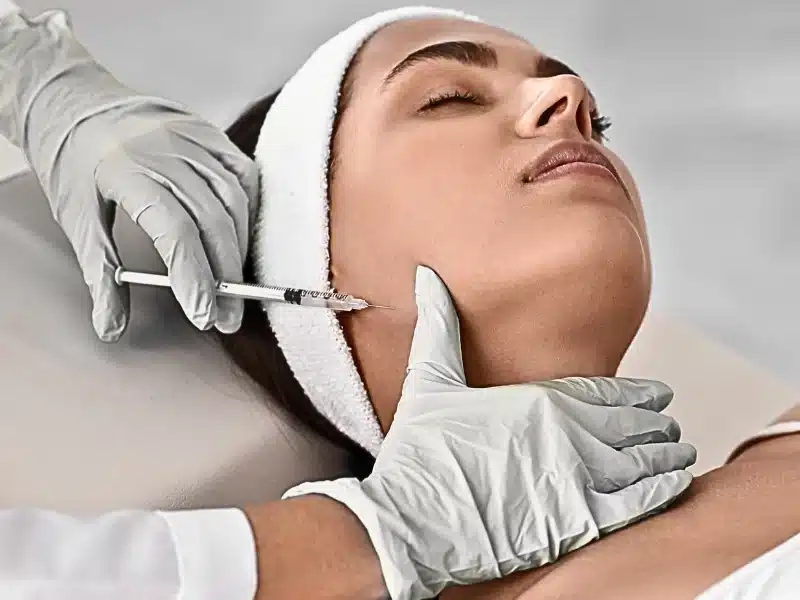 jaw filler being injected to patients jaw